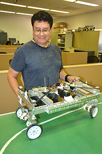 Craig One Feather in the Robotics Lab